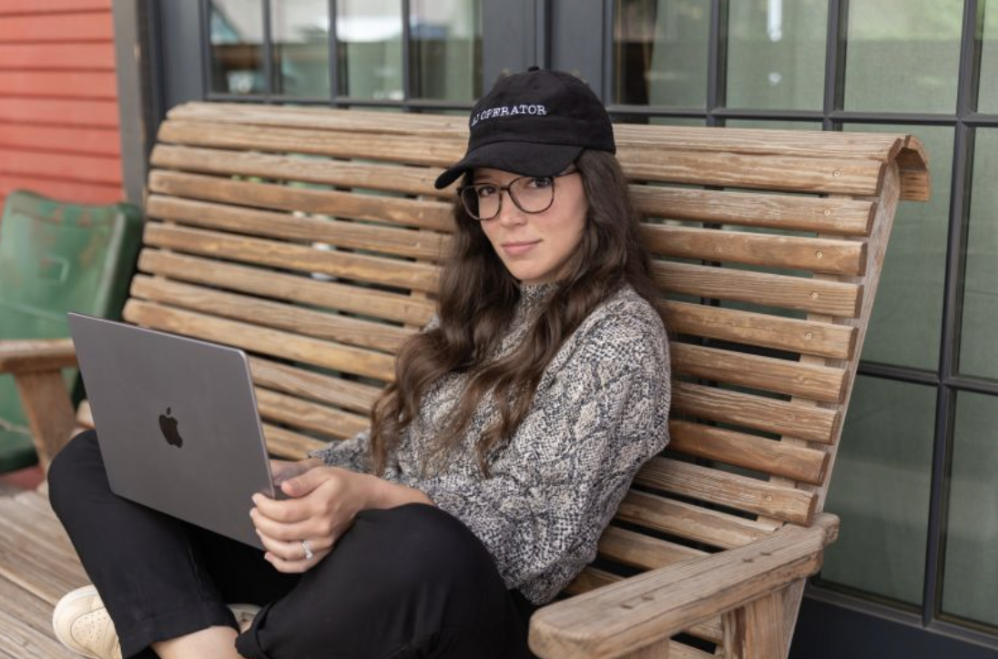 Rachel Woods working on a laptop